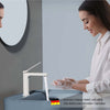 Waschtischarmatur mit abgewinkeltem Griff und wassersparender Funktion